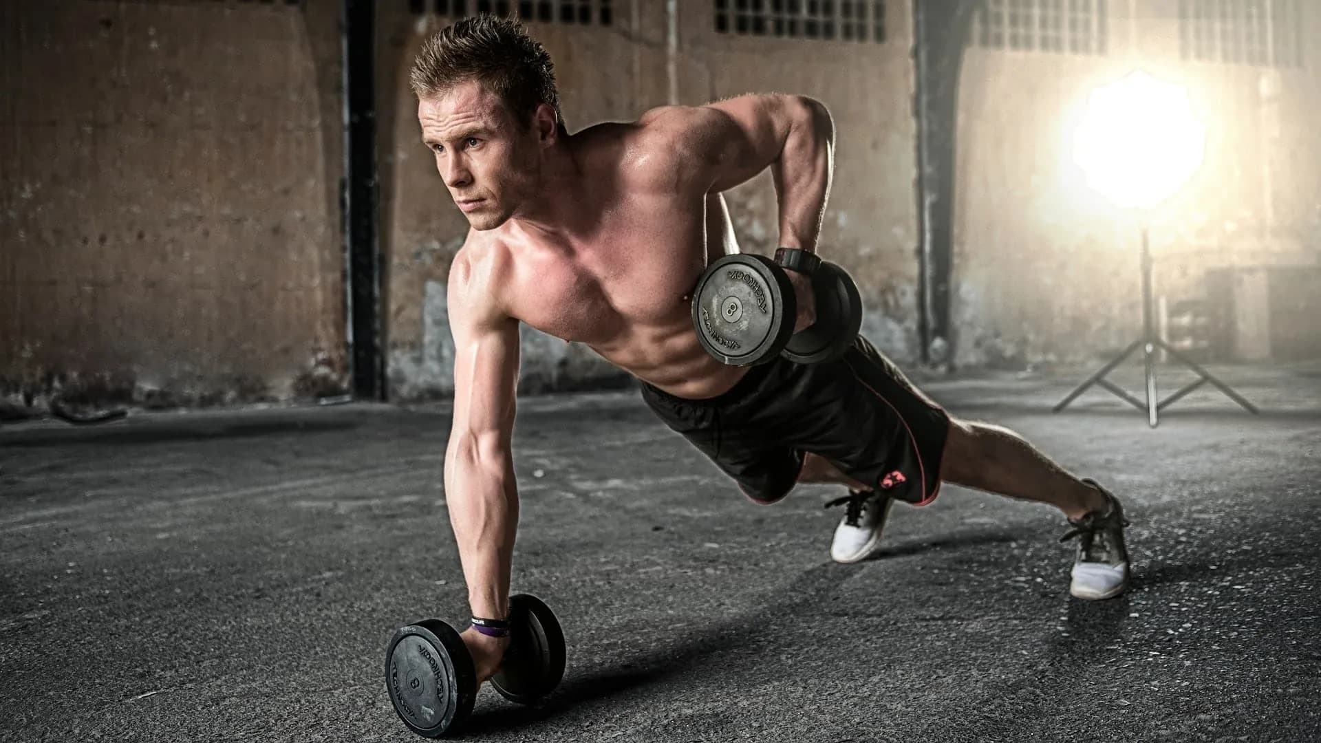 Athlete performing a box jump during high-intensity personal training